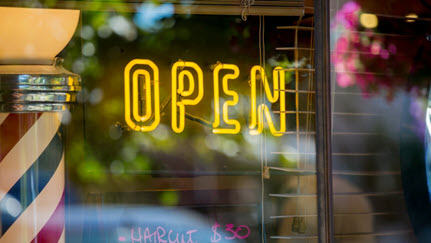 open sign in store window