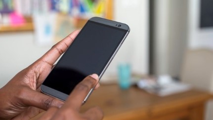 hands holding a mobile phone