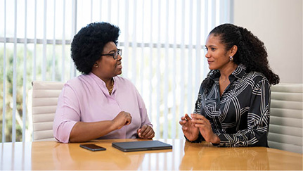 Employees discussing their career goals