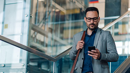 man looking at his phone