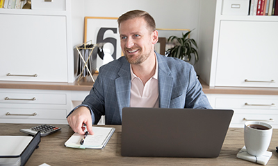 man sitting at a desk