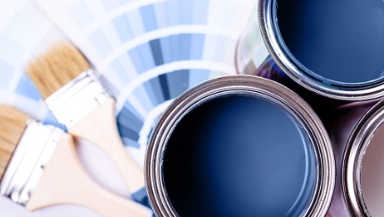 paint cans, brushes, and swatches