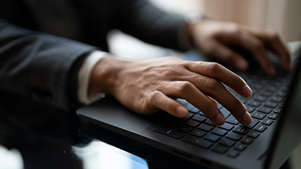 typing on a laptop