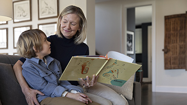 Woman reading to child
