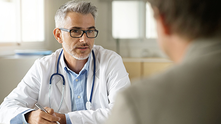 physician talking to injured employee