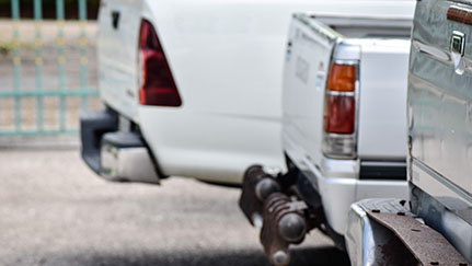 small fleet of pick-up trucks